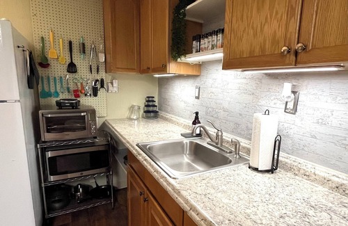 Greeley Apartment | Garden level 1-bedroom apartment, private entrance. Month-to-month.