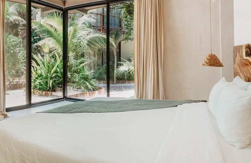 Zona Hotelera Apartment | Garden View Suite with the Perfect Location