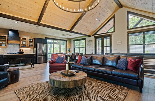 Cherry Log Cabin | Gated mountaintop retreat with expansive outdoor living, game tables, & hot tub