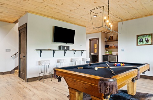 Cherry Log Cabin | Gated mountaintop retreat with expansive outdoor living, game tables, & hot tub