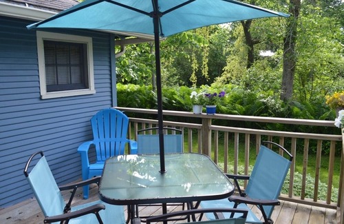 Baileys Harbor Cottage | Get away at this quaint cottage tucked behind a beautiful fern bed.