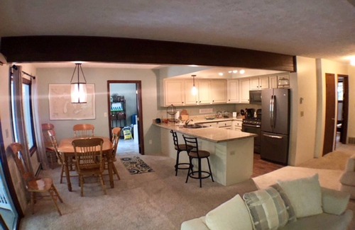 Higgins Lake House | Get away to this beautiful open concept house within walking distance to Higgins