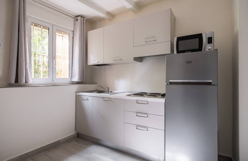 Historic Center Apartment | Giardini Margherita White Studio by Wonderful Italy