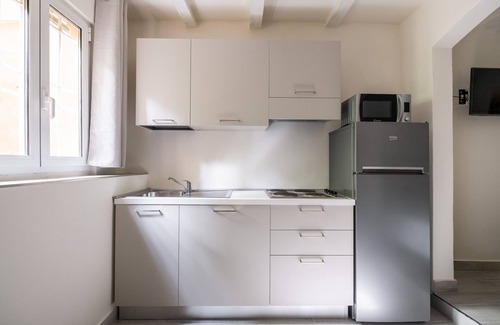 Historic Center Apartment | Giardini Margherita White Studio by Wonderful Italy