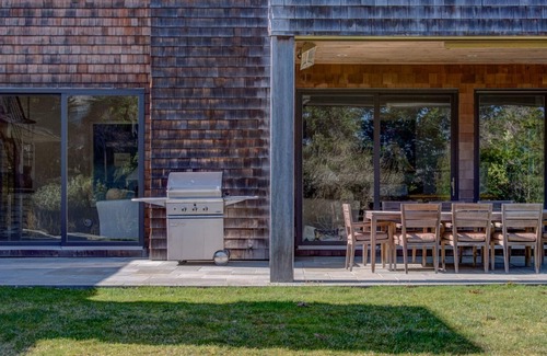 Sagaponack House | Glam-style home with private pool, open-floor plan, floor-to-ceiling.