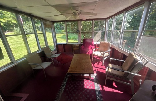 Taberg House | Glenmore Creek, ranch style home located on 10, mostly wooded, private acres.