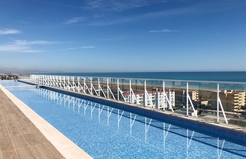 Canet de Berenguer Apartment | Global Properties: Modern flat with swimming pool and terrace on the beach of Canet