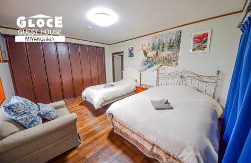 Miyakojima Apartment | GLOCE PORT SIDE HOUSE l 砂山ビーチ近くのオーシャンビューバルコニーハウスを貸切 長期滞在向け BBQ可