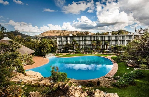 Maseru Apartment | Go on Safari in South Africa! Shuttle Service, Free Parking and Outdoor Pool!