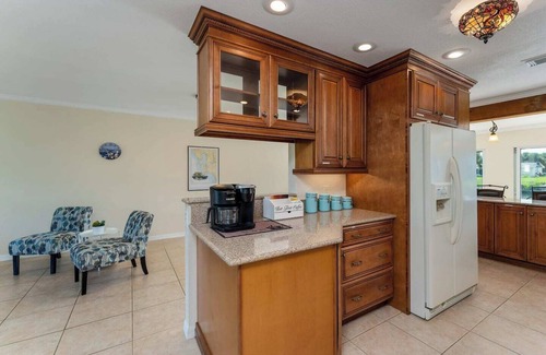Port Charlotte House | GoGo House. Charming 2 BR, 2 BA, Waterfront Vacation Rental in Port Charlotte, FL, w/Heated Private Pool & Spa