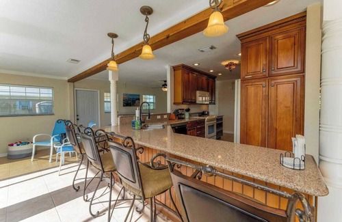 Port Charlotte House | GoGo House. Charming 2 BR, 2 BA, Waterfront Vacation Rental in Port Charlotte, FL, w/Heated Private Pool & Spa