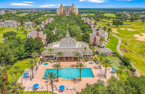 Reunion House | Golf course view - Wood floors, DVR, pool hot tub, movie theatre, resort pools.