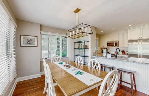 West Beach Village House | Golf-view villa with private deck, AC, & W/D - walk to beach - dog-friendly