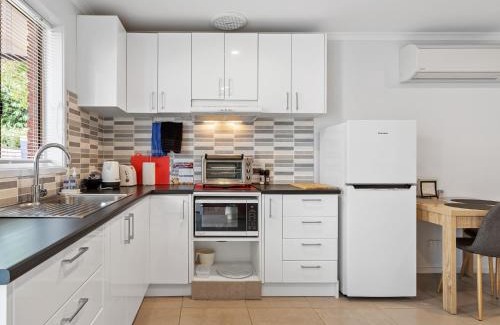Rosebud House | Golfside Getaway 2 by Ready Set Stay