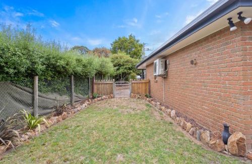 Rosebud House | Golfside Getaway 2 by Ready Set Stay
