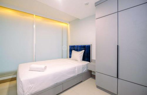Pekayon Jaya Apartment | Good Choice and Cozy 2BR Grand Kamala Lagoon Apartment By Travelio