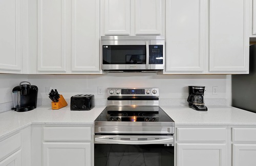 Kissimmee Villa | Gorgeous 12 bedroom/11.5 bath/Theater/Sleeps 30/Game Rm/15 mins to Disney Parks