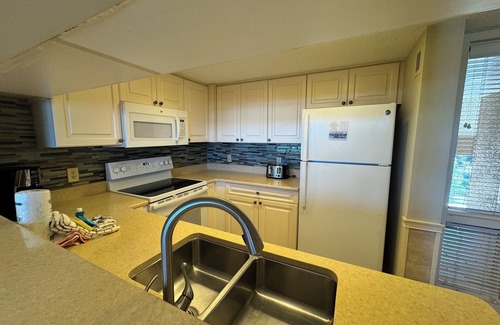Shelter Cove Condo | Gorgeous 2 bedroom villa overlooking Shelter Cove Harbour with pool and spa