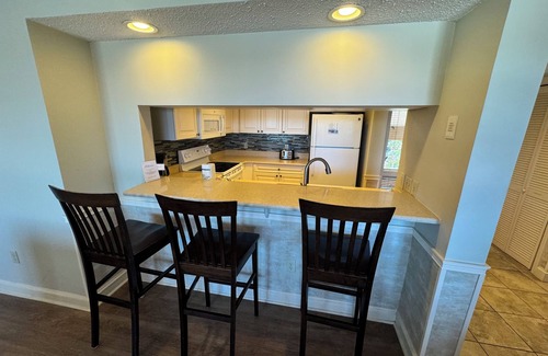 Shelter Cove Condo | Gorgeous 2 bedroom villa overlooking Shelter Cove Harbour with pool and spa