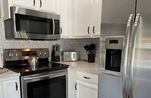 Florida Shores House | Gorgeous 3 bedroom home close to the ocean! With saltwater solar heated pool!