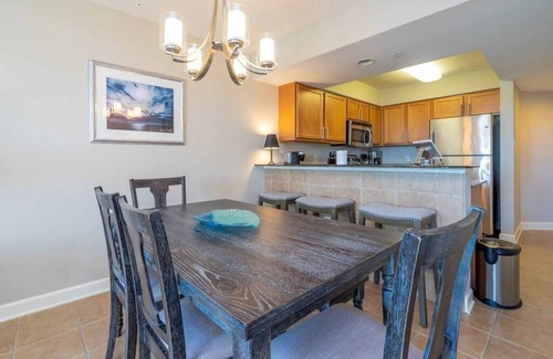Ash Condo | Gorgeous, amazing ocean view just steps away from the beach. Covered parking.