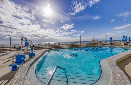 Fort Bay Condo | Gorgeous beachfront condo with shared pool, hot tub and beach access