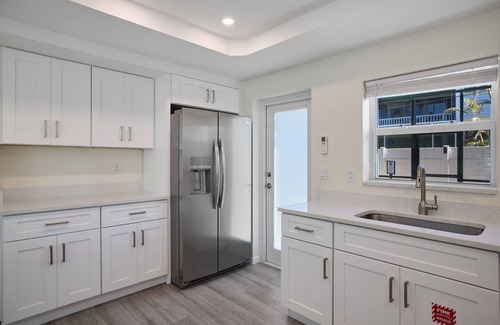 Mid Island Condo | Gorgeous condo with pool and spa at Margarita Mansion