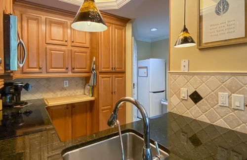 Central Naples Condo | Gorgeous Ground Floor Condo in World Class Resort, Pool, Spa, Amenities Galore!