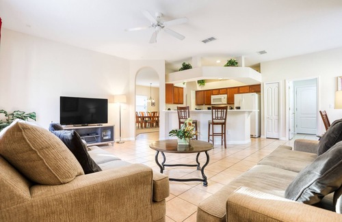 West Haven House | Gorgeous home near Disney with private pool, pool spa, on-site gym, tennis, AC