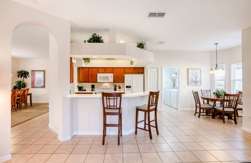 West Haven House | Gorgeous home near Disney with private pool, pool spa, on-site gym, tennis, AC