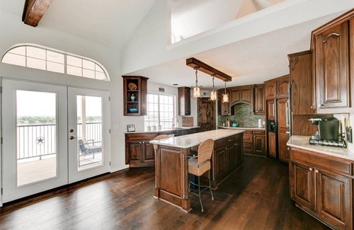 Granbury House | Gorgeous home with a view from every room with swim deck and boat dock