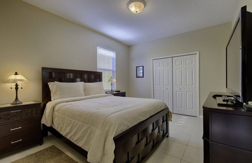 Buena Ventura Lakes Villa | Gorgeous home with pool, game room, hot tub and near golf course!