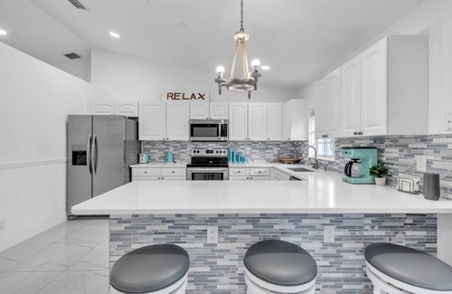 Palm Beach - West Palm Beach House | Gorgeous Lake Worth Beach House by RedAwning