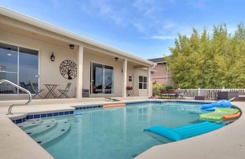 Mariner's VIllage House | Gorgeous Lakefront Pool Home W paddleboard, kayak, game room, king bed, and more