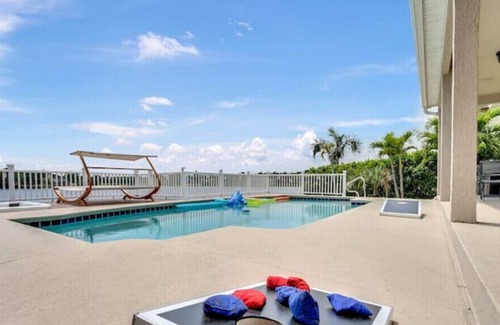 Mariner's VIllage House | Gorgeous Lakefront Pool Home W paddleboard, kayak, game room, king bed, and more
