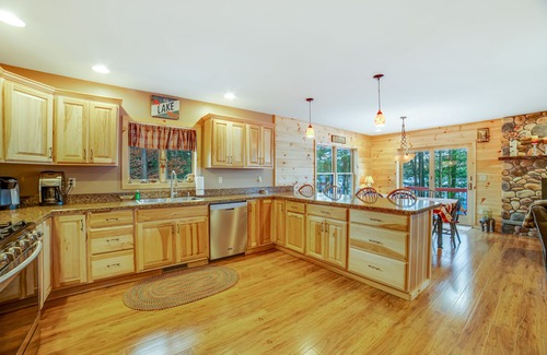 Chestertown House | Gorgeous Lakefront Home with a Fire Pit, Two Living Areas, and a Sunroom