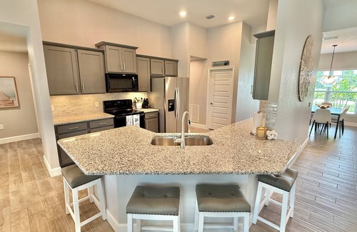 Pinehurst House | Gorgeous Newer 4bd/2ba Canal Home, Large Heated Pool/Hot Tub, Game Room, Pets Ok