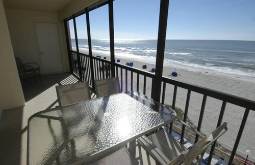 Indian Shores Condo | Gorgeous Sunset Views from Sand Castle 3 Condo. 3/2, heated pool, beachfront