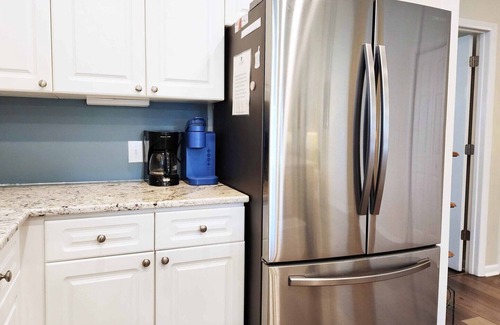 Litchfield by the Sea Condo | Gorgeous View of Osprey Lake & Near pool & Beach at Litchfield by the Sea