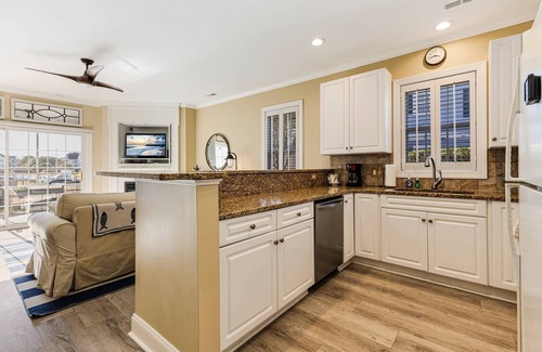 St. James Condo | Gorgeous Views of the St James Marina from this 1st Floor Dog Friendly Condo