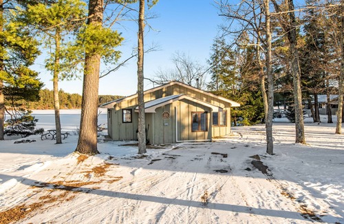 Three Lakes Cabin | Gorgeous water views, deck, private boat slip, indoor pool, hot tubs, & gym