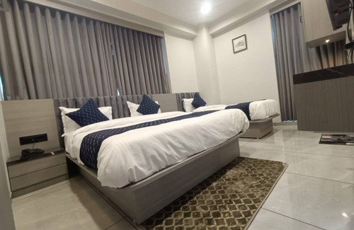 Chandkheda Hotel | Goroomgo Asiana Motera Ahmedabad