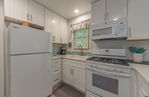 Saugatuck House | Goshorn 18 - Located in Goshorn Lake Resort - Shared pool - Lake access