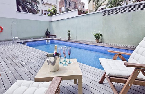 la Vila de Gracia Apartment | Gràcia: Cozy duplex with shared pool + terrace
