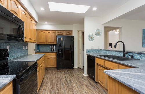 Bella Vista House | Gracious living. Swing bed with golf course view. Back 40 bike trail access.