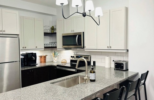Grand Bend Apartment | Grand Bend Escape Central Luxury - Overlooking Main Street - Walk to Beach
