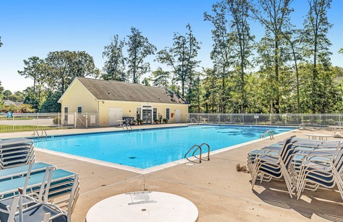 Rehoboth Beach Condo | Grande at Canal Pointe 1st floor condo w/shared pool, tennis court & gym