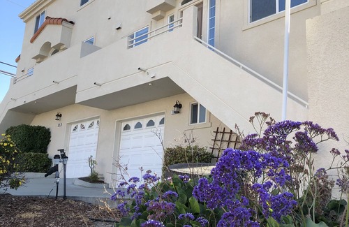 Motel District Condo | Great location! Easy beach access! Sleeps 12