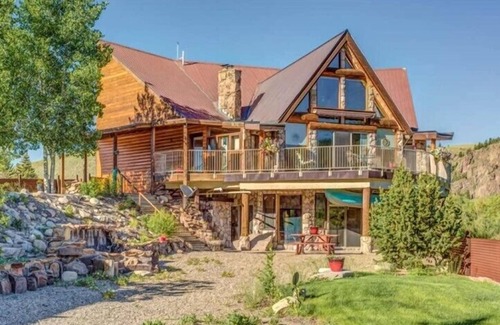 Almont House | Great location on the Taylor River with fishing access!