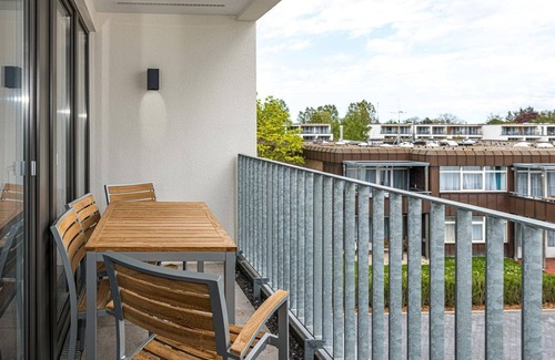 Bensersiel Apartment | Great North Sea apartment with balcony, parking, use of swimming pool & sauna -
